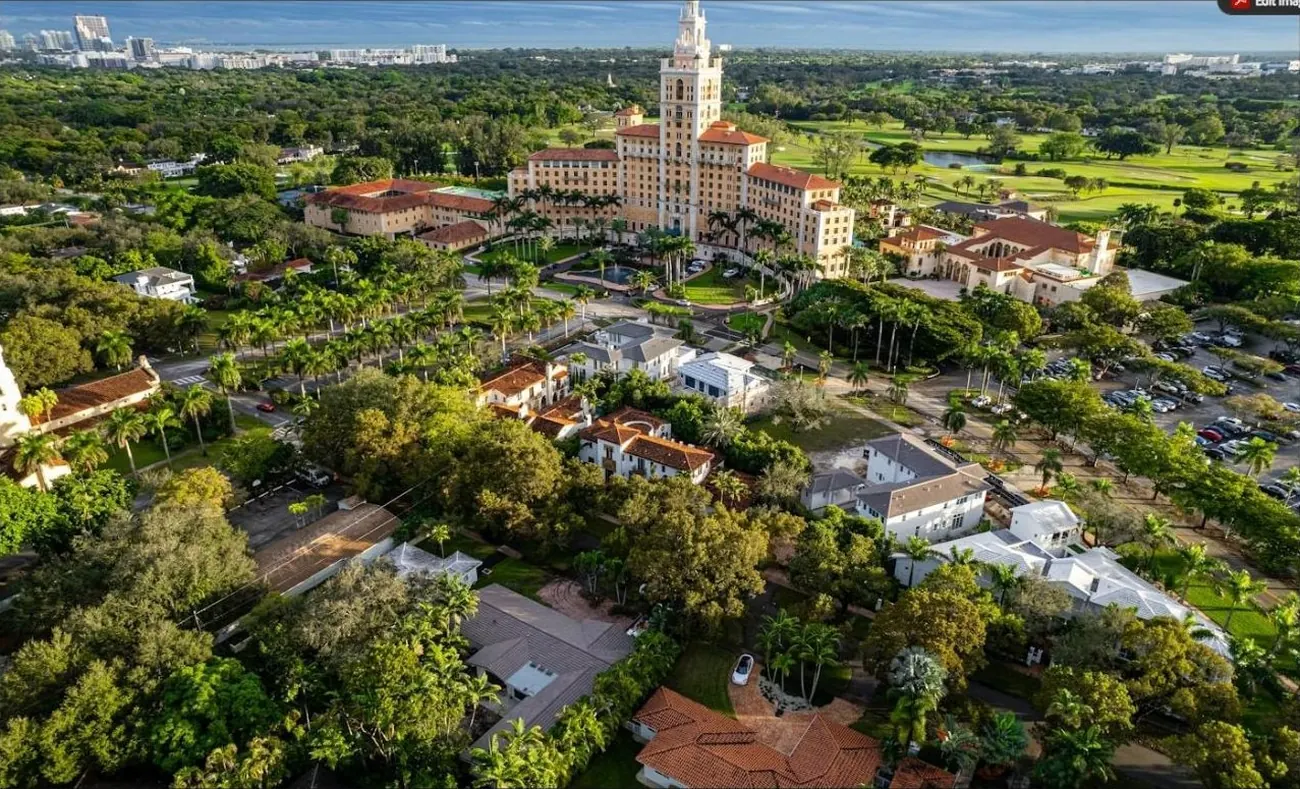 Aerial view of the Biltmore Hotel and tree-lined streets of Coral Gables