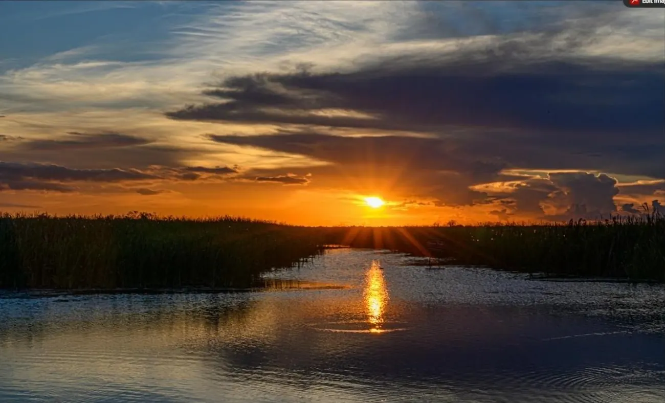 Sunset over the Everglades sawgrass and water near Homestead